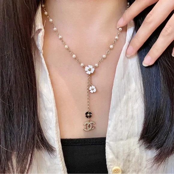 CHANEL Gold and White Floral Necklace - Picture 2 of 9